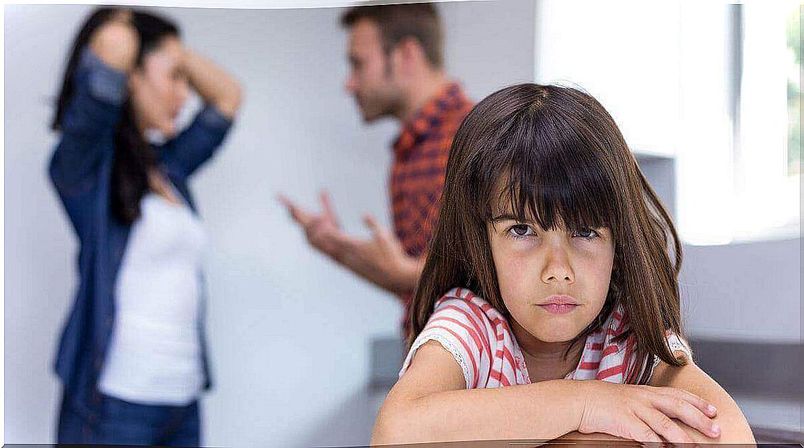 Sad girl with parents fighting