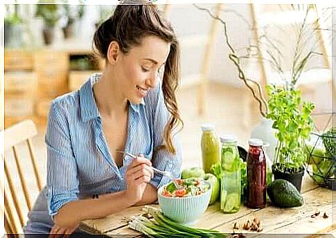 woman eating a salad