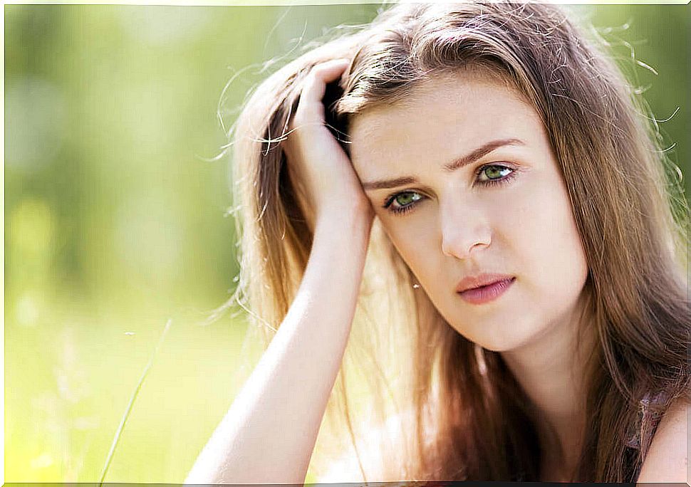 Worried woman holding negative thoughts