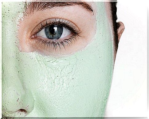 Woman with clay mask