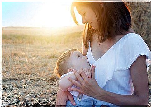 mother breastfeeding her child