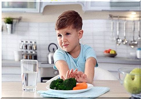 boy refusing vegetables