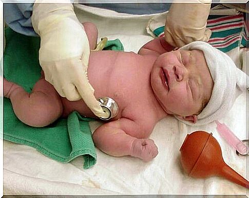 newborn being examined